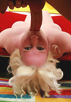 Huge blonde bbw Tina pleasures a big fat cock by cramming it down her deep throat