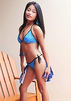 Bikini teen Thainee shows off her sexy petite body